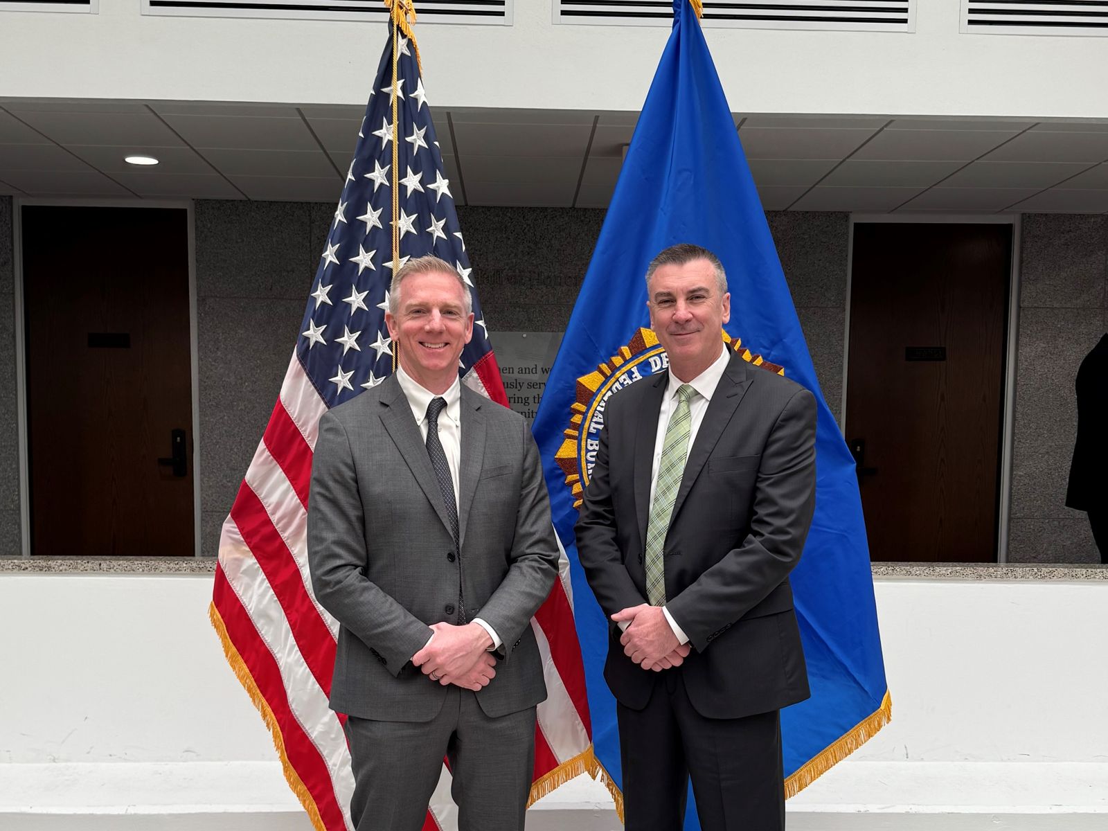 Director Brian Bassett and Lieutenant Matthew McPhillips at Lt. McPhillips' FBI National Academy graduation, March 2026