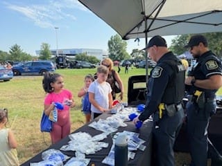 Officers with residents at National Night Out