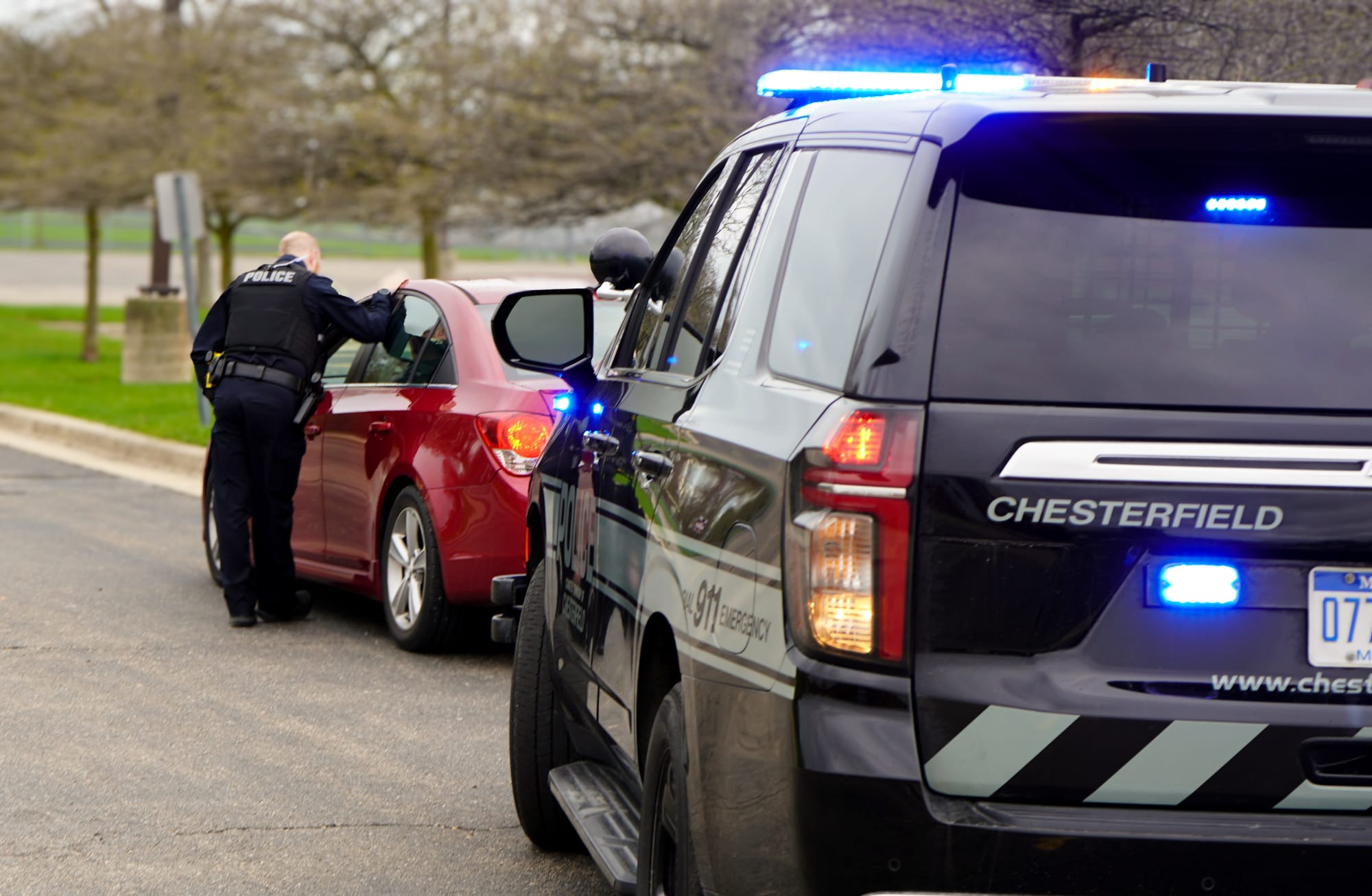 Chesterfield Township traffic officer speaking with a driver during a traffic stop