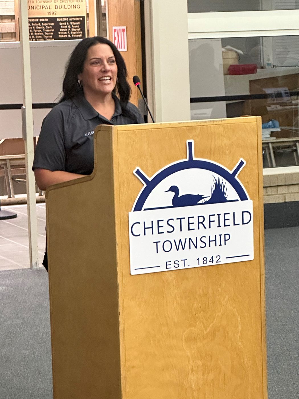 Chaplain Kim Fleece speaking at a Chesterfield Township ceremony