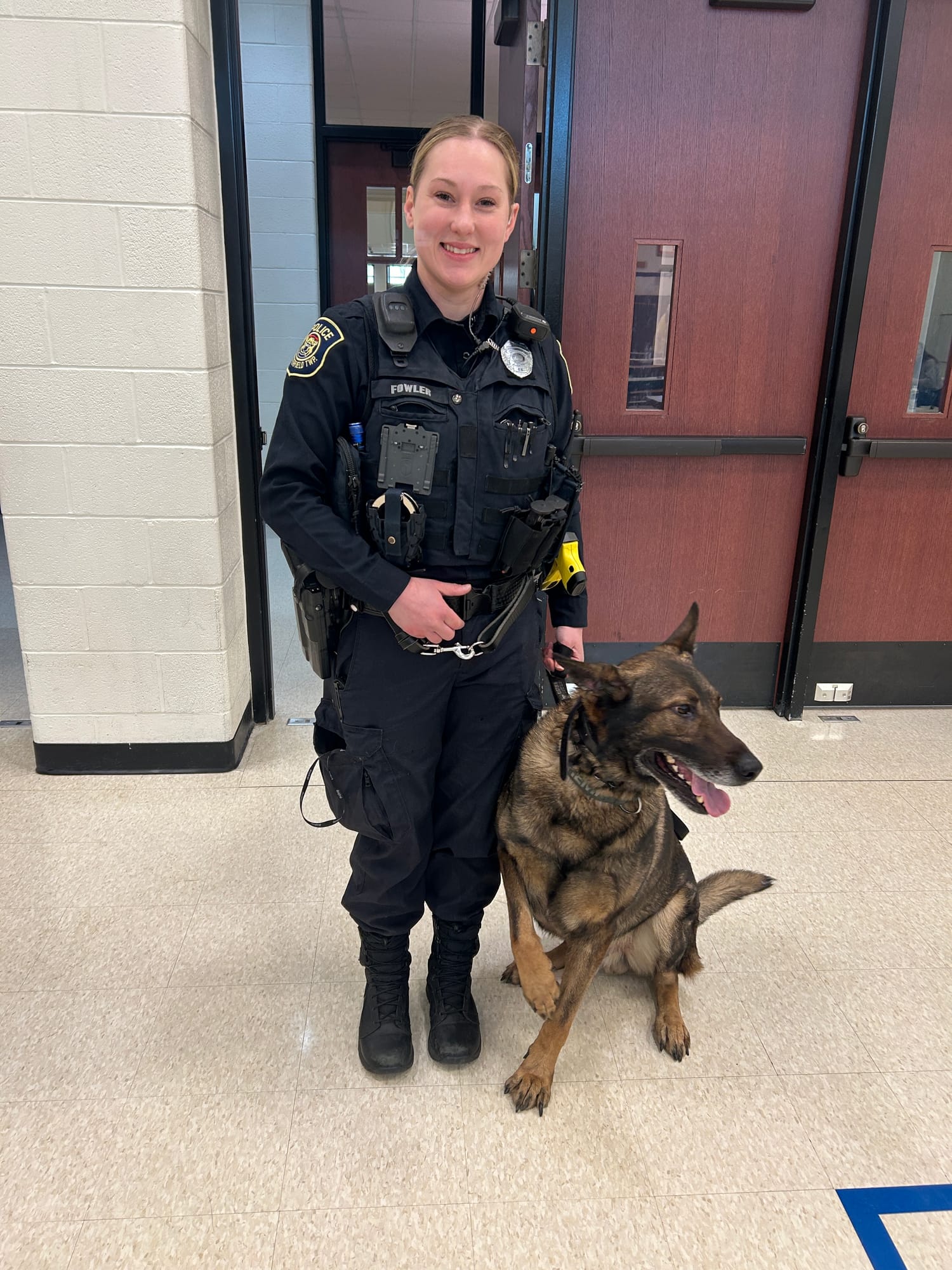 Officer Hallie Fowler with K-9 Hemi