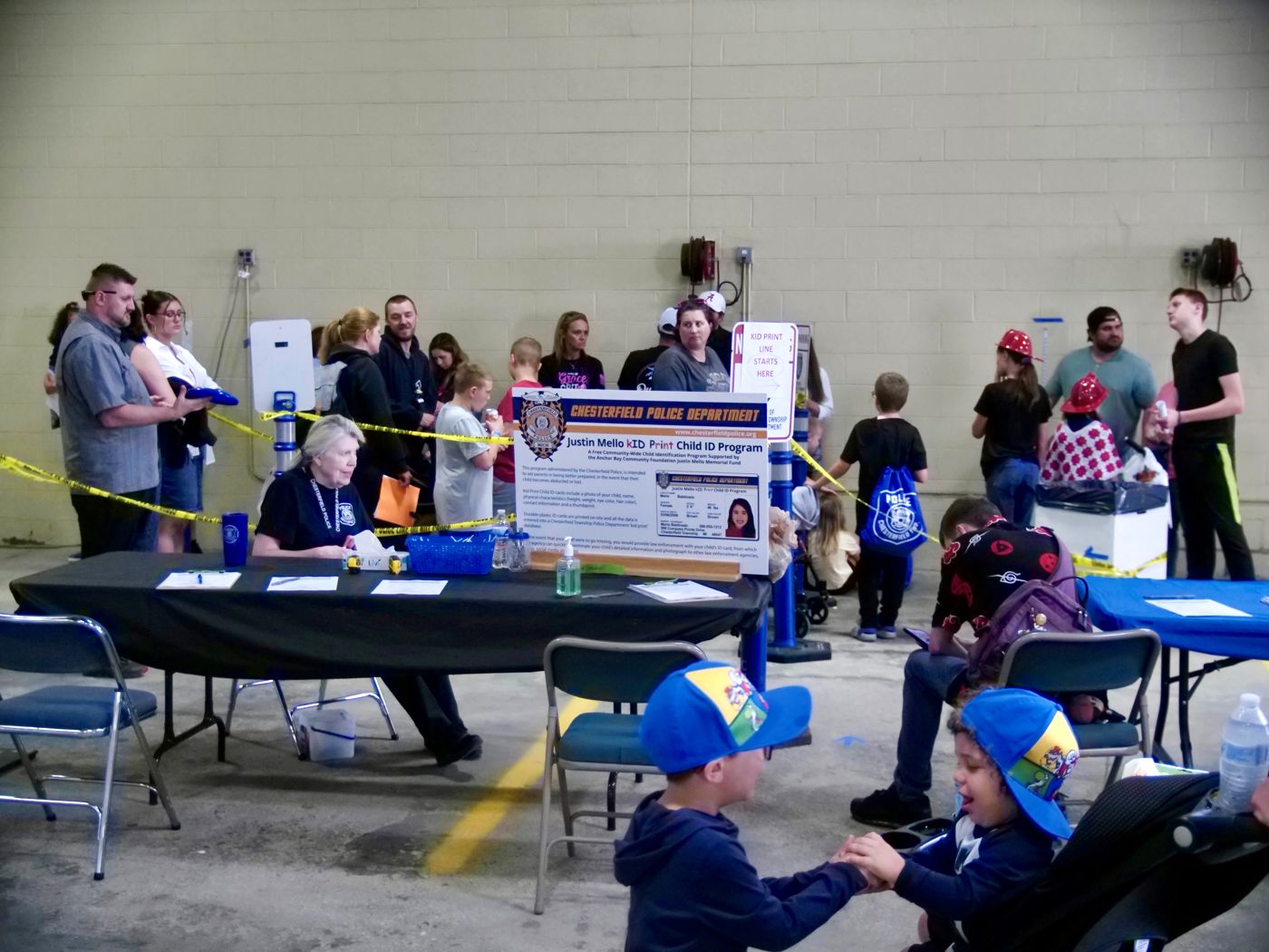 Families lined up for kID Print at the 2024 open house