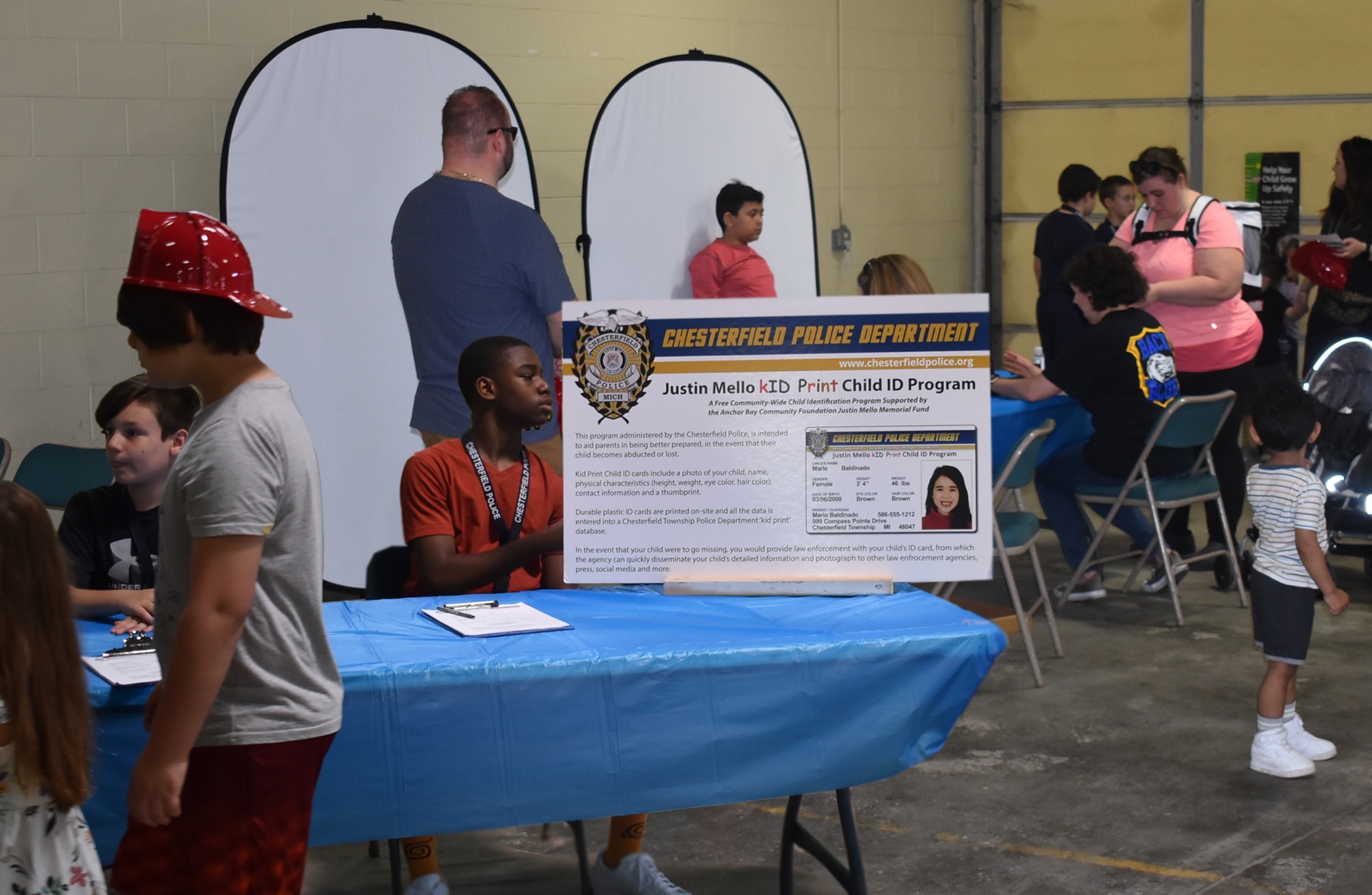 The Justin Mello kID Print Child ID station at the department open house